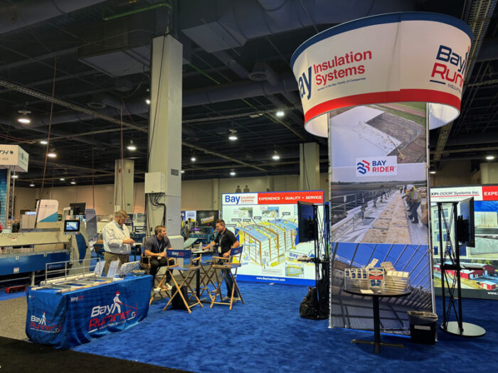 pictures of Bay Insulation Systems' tower display at Metalcon 2025
